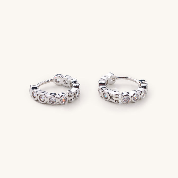 Nikki Smith Designs • Celia Circle Gem Huggies - Silver